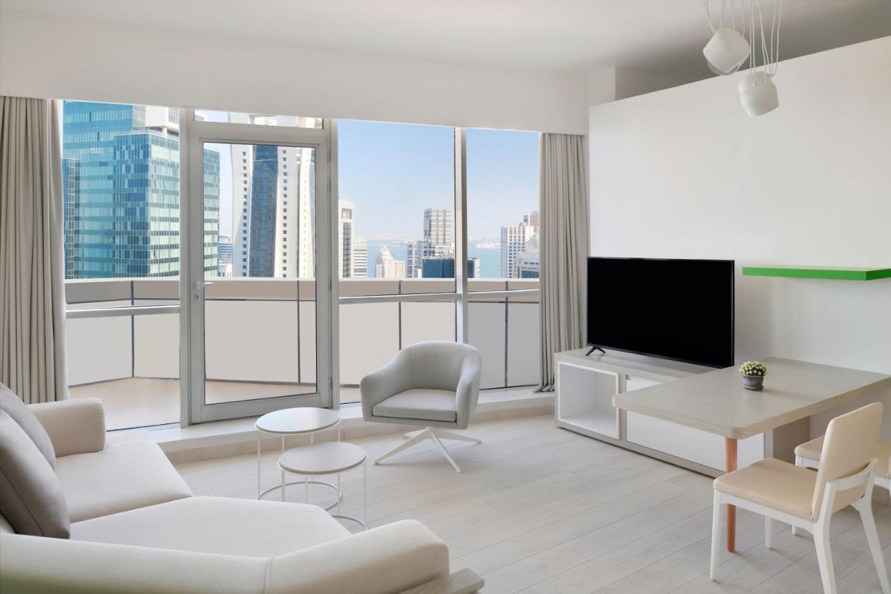 Element By Westin West Bay Doha Hotell Exteriör bild A living room in a condominium