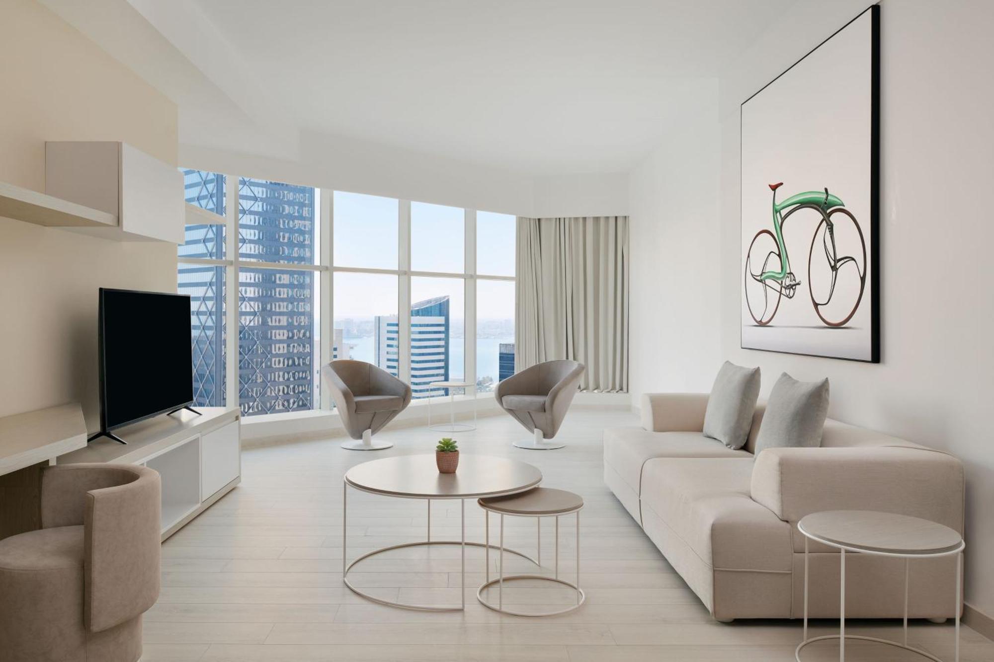 Element By Westin West Bay Doha Hotell Exteriör bild A living room in a condominium