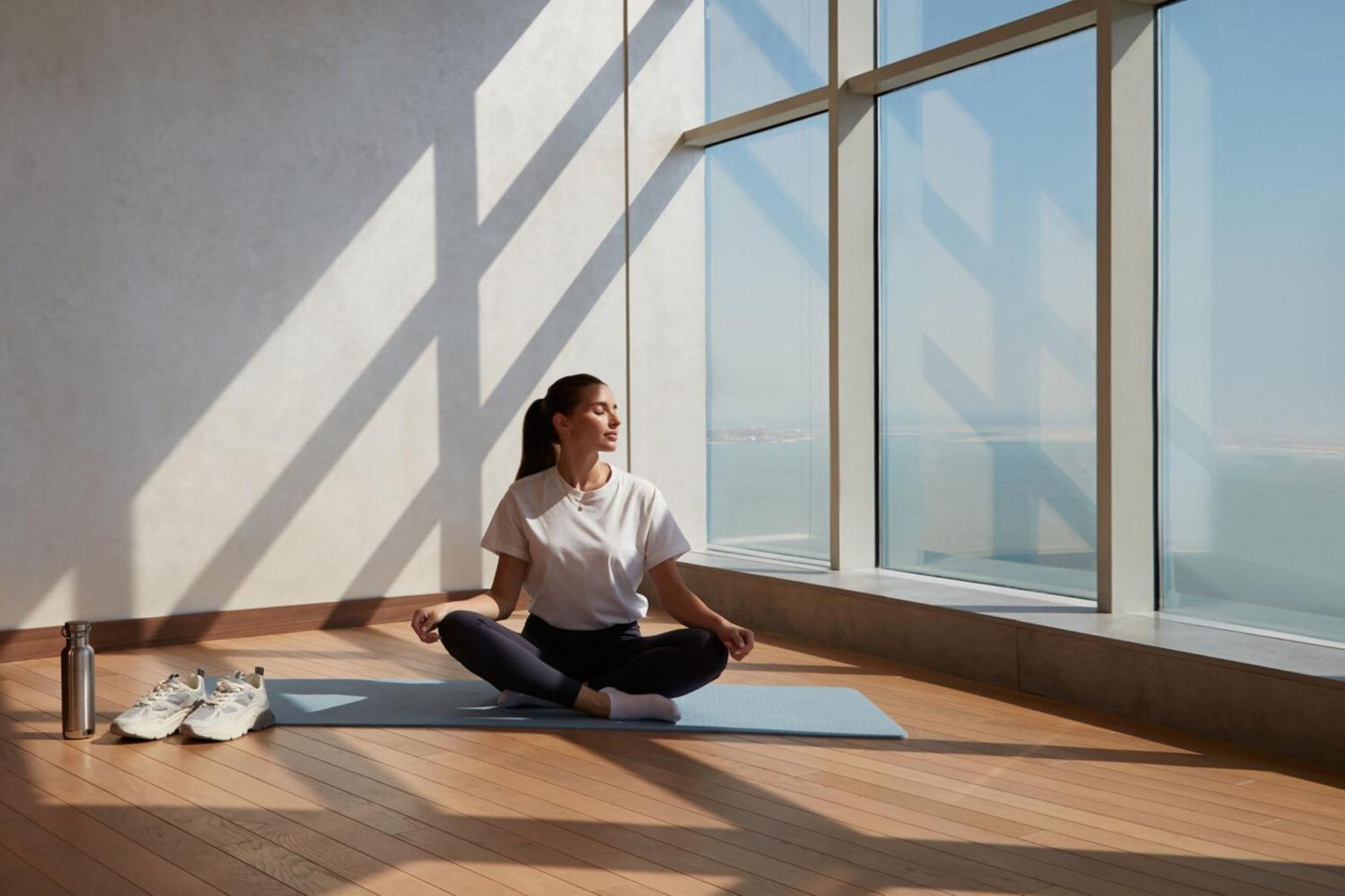 Element By Westin West Bay Doha Hotell Exteriör bild A woman meditating